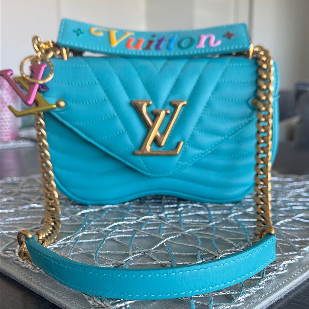 Louis Vuitton Turquoise Quilted Chain Shoulder Bag with a LV purse charm